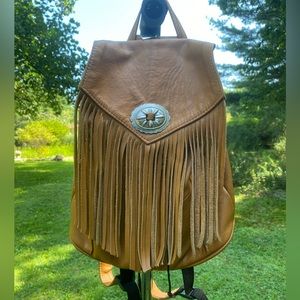 Mexican Leather fringed convertible bag from Three Bird Nest